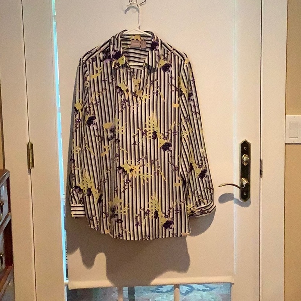 Black and white striped blouse with purple flowers.